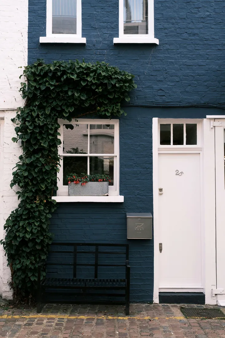 Period townhouse with a navy painted lower façade, London