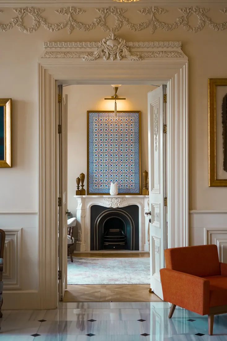 Period room with painted walls and fine joinery, London