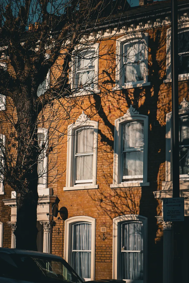 Red brick townhouse with sash windows, Marylebone, London