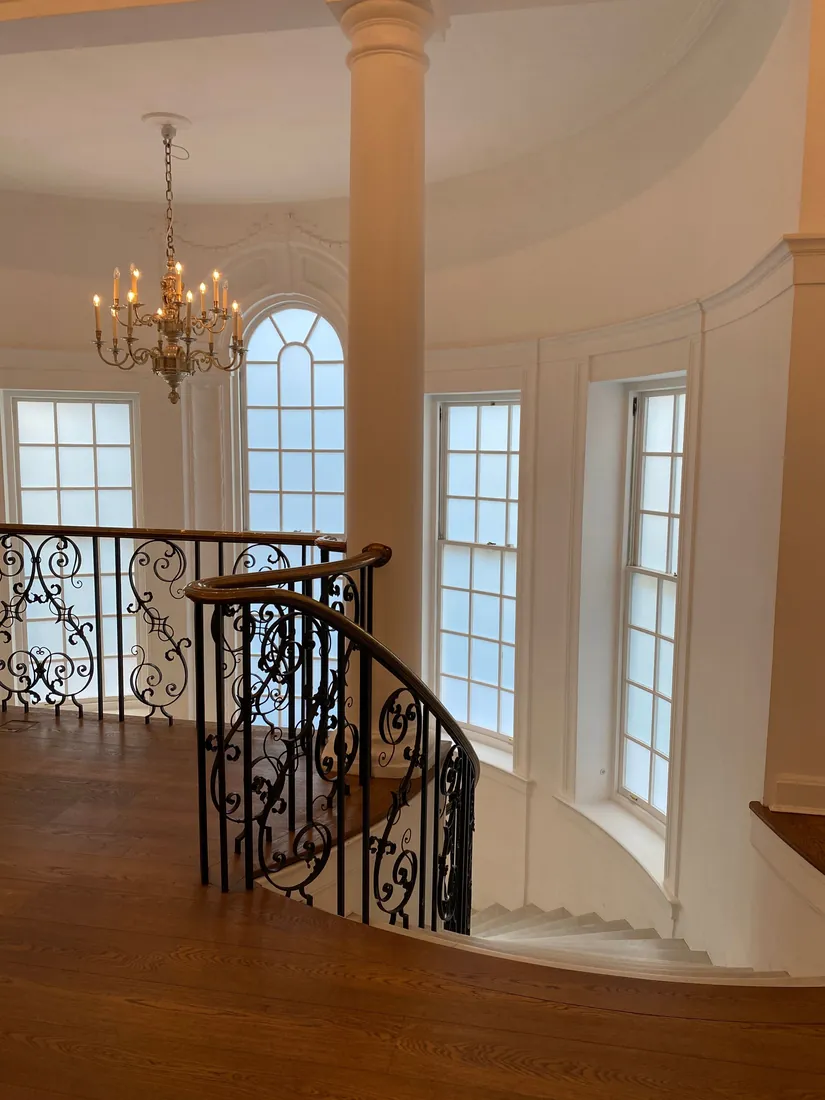 Period hallway and staircase with painted balustrade in a London townhouse by The Finishing House
