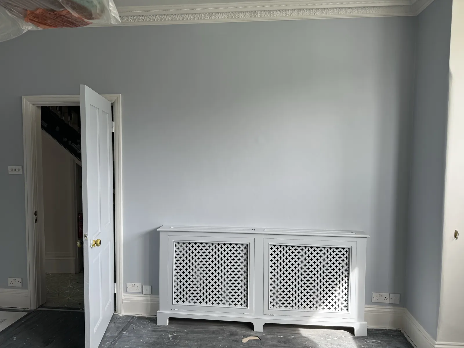 Bedroom in soft grey-blue with radiator cover, Notting Hill