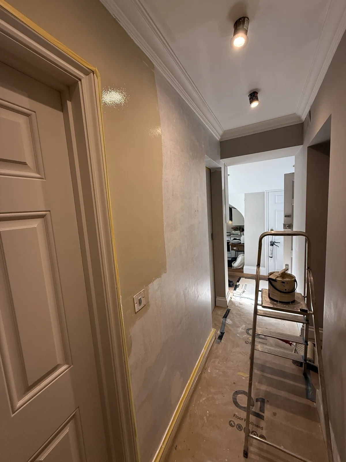 Hallway plaster repairs before painting, Chelsea