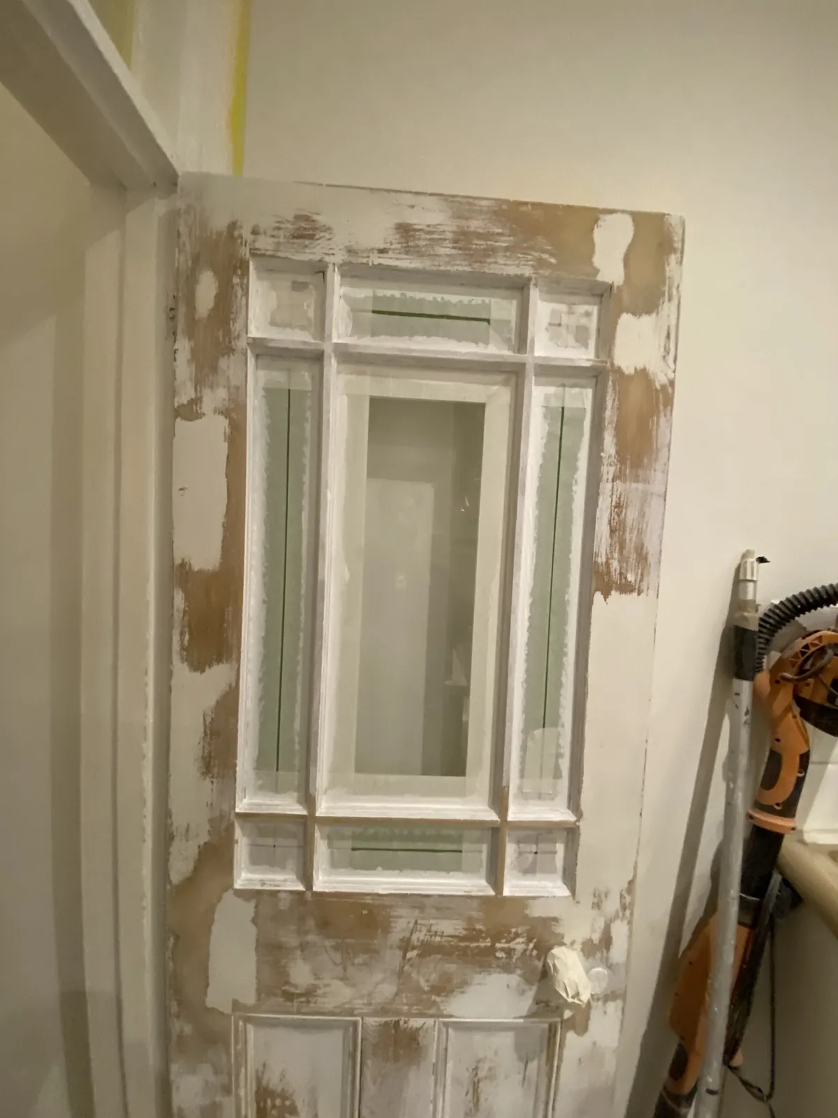 Panelled door stripped back to bare timber, Kensington