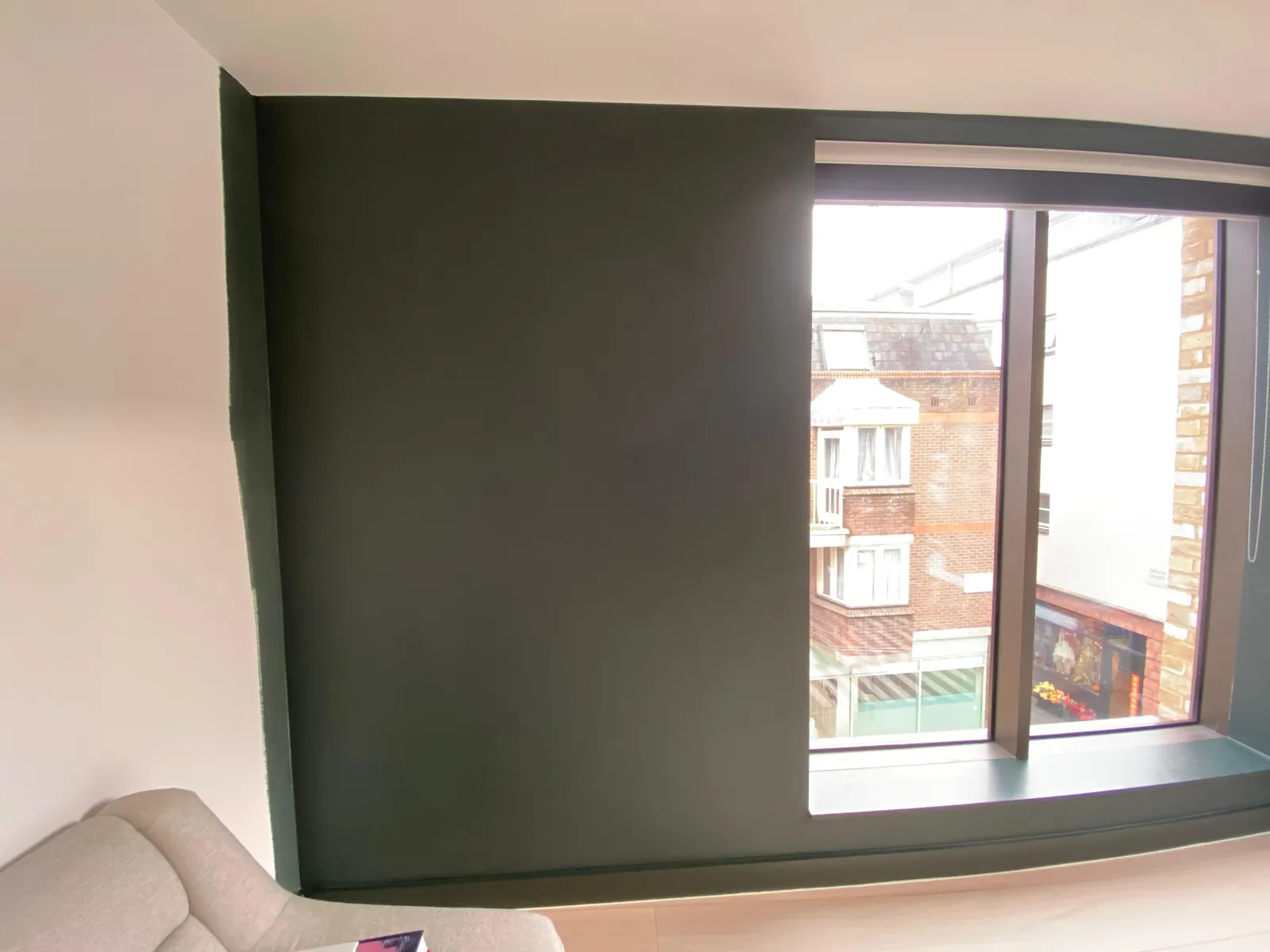 Feature wall in forest green around the window, Notting Hill