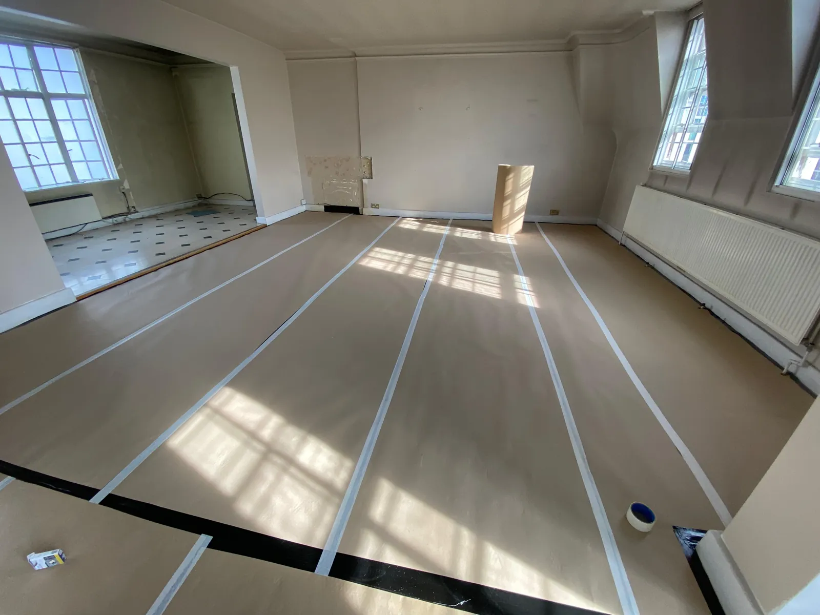 Drawing room floor sheeted and taped, Mayfair