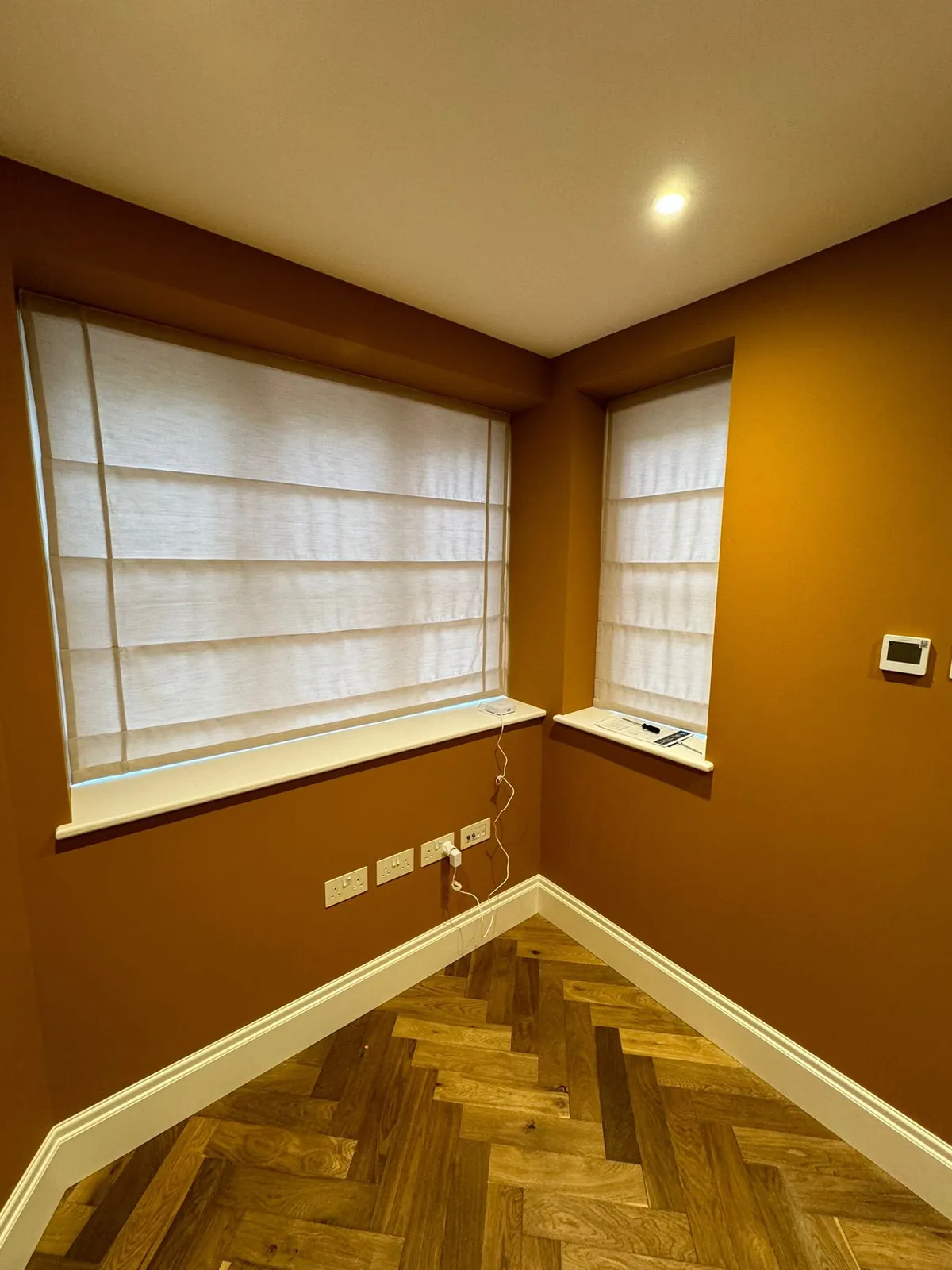 Living room in burnt orange, Kensington