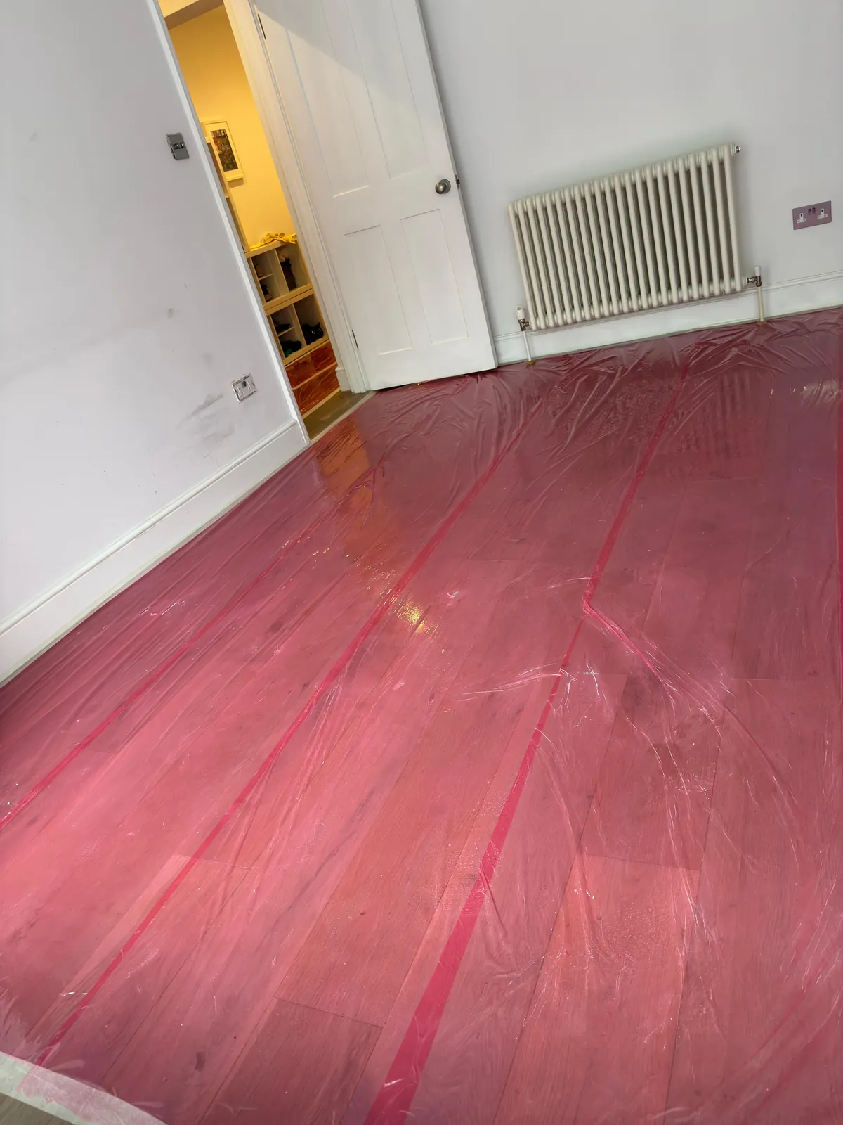 Bedroom floor protected before decorating, Marylebone