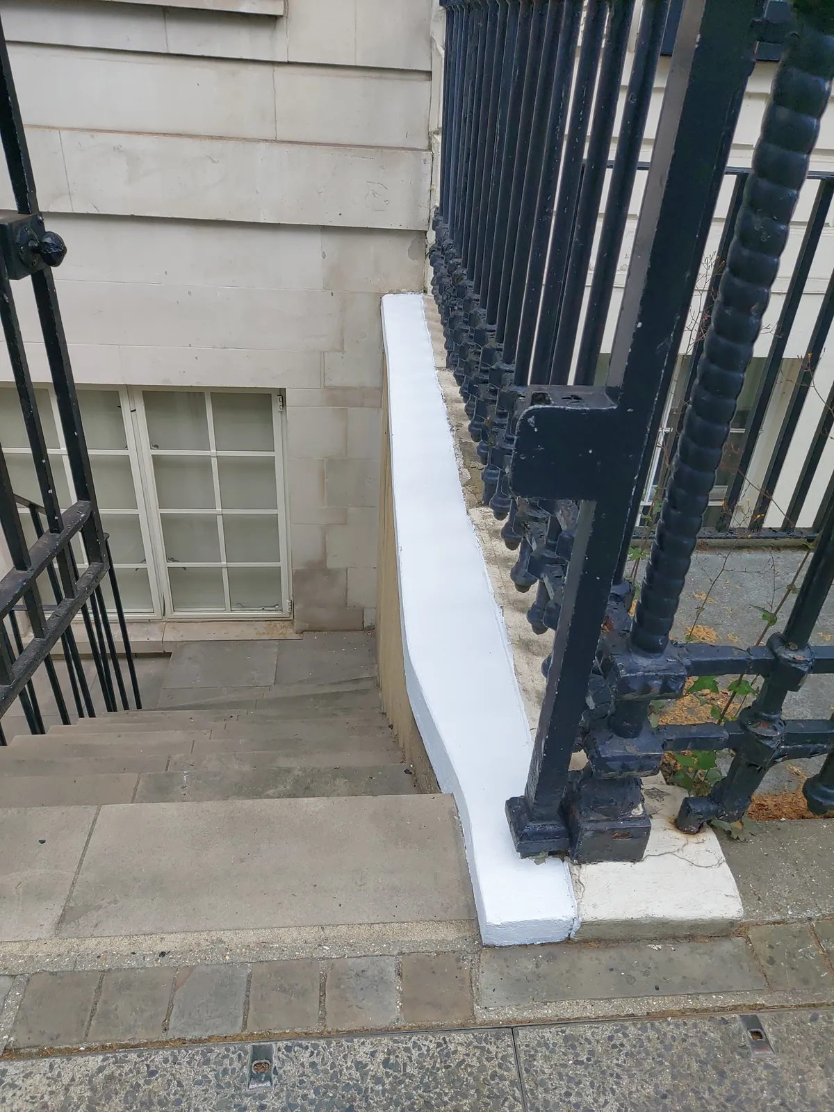 Painted plinth wall and basement steps, Marylebone