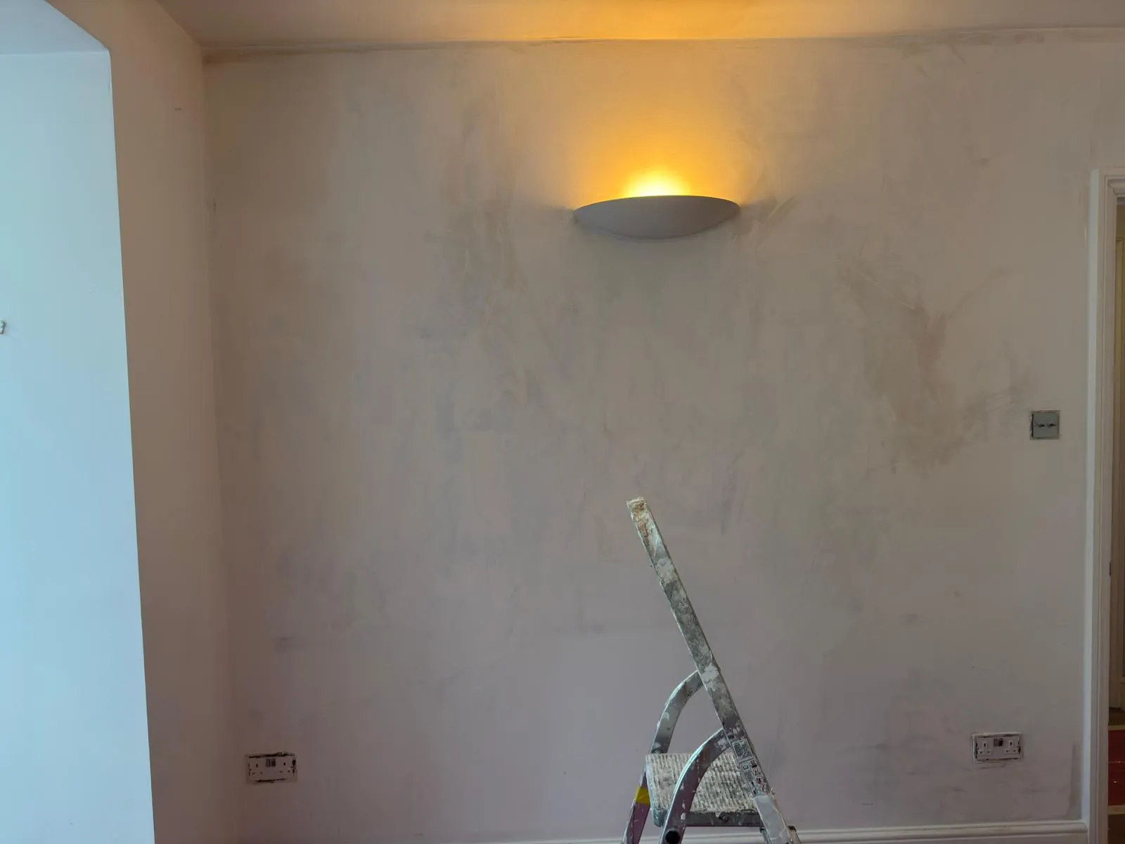 The same reception room wall before painting, plaster made good, Marylebone