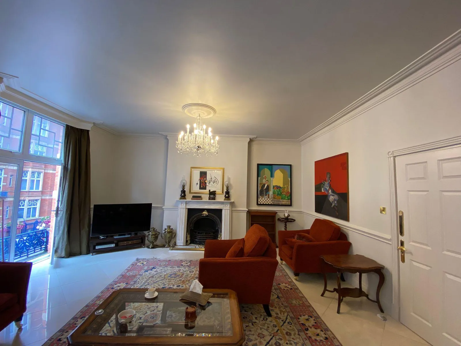 Reception room with painted panelled walls, Mayfair
