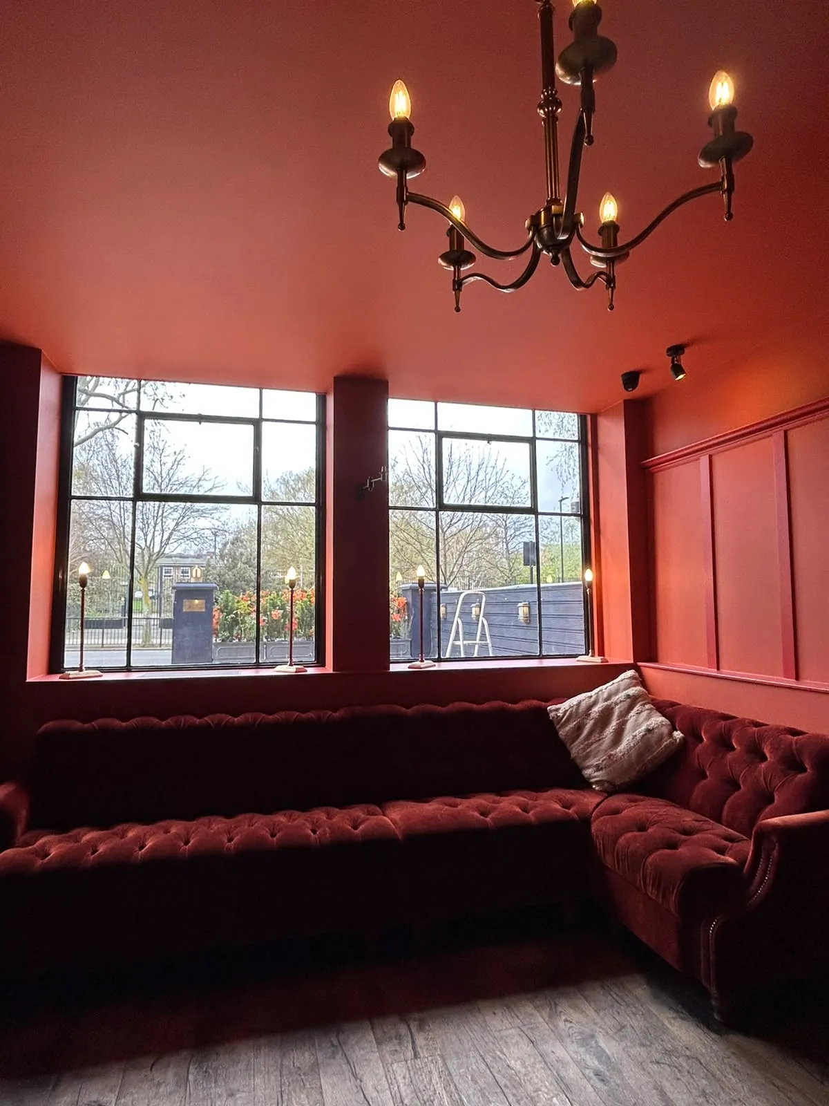 Restaurant in deep red panelling, Notting Hill
