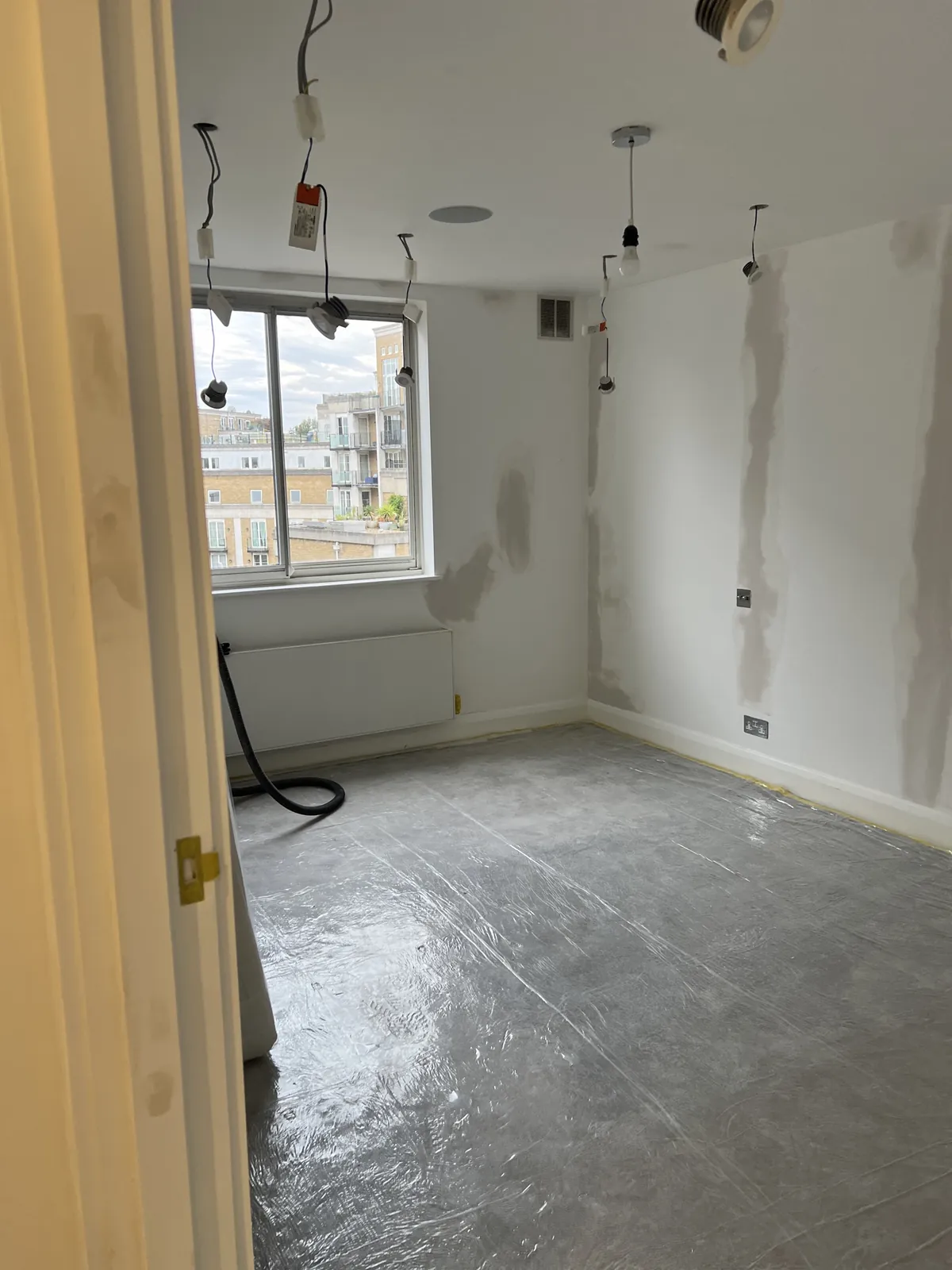 Walls filled with dust extraction in use, St John's Wood