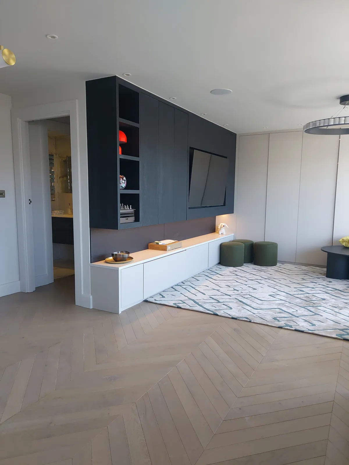 Living room, painted walls over a herringbone floor, St John’s Wood