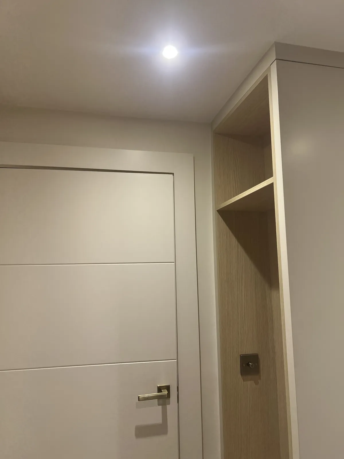 Grooved wardrobe door, walls finished, St John's Wood