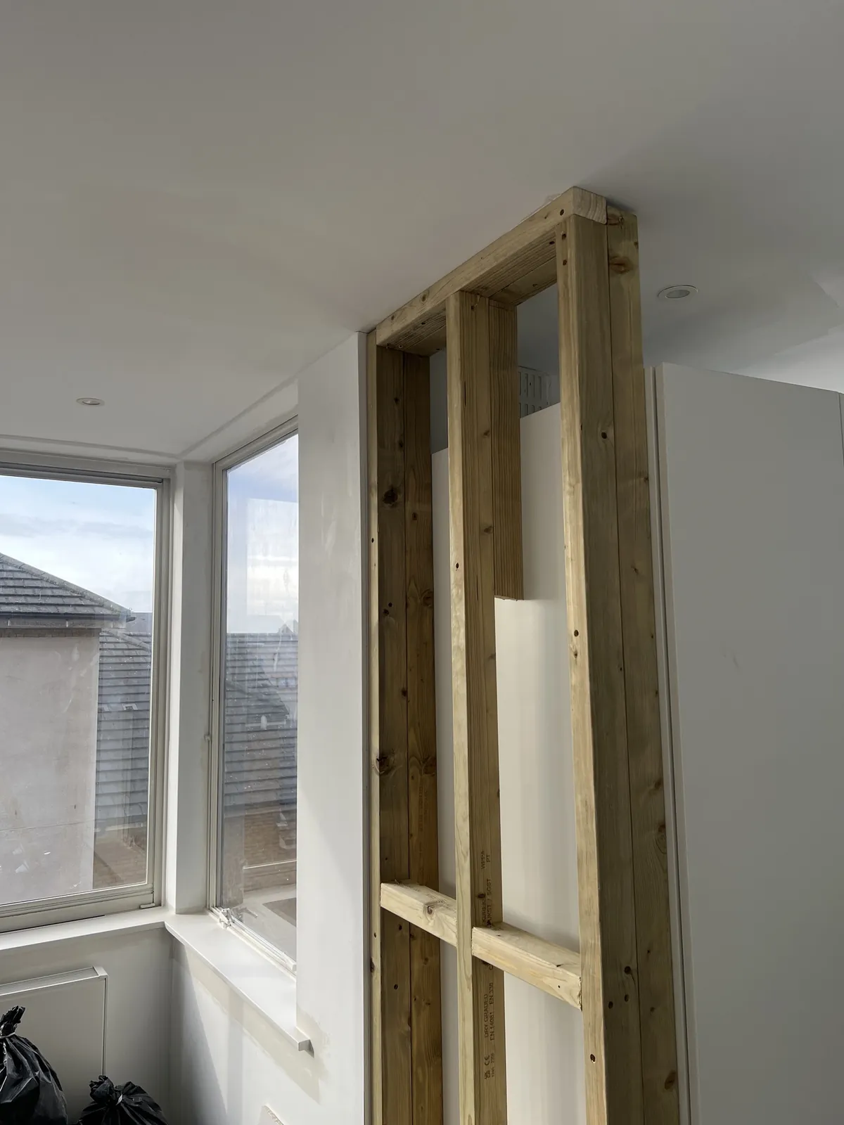 Timber stud partition before boarding, St John's Wood